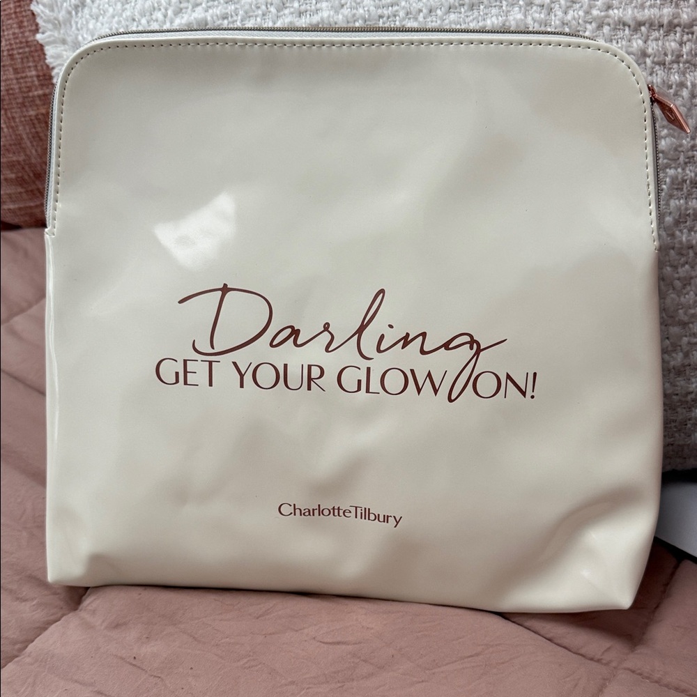 Charlotte Tilbury Cream Cosmetic Bag with Rose Gold Accents
